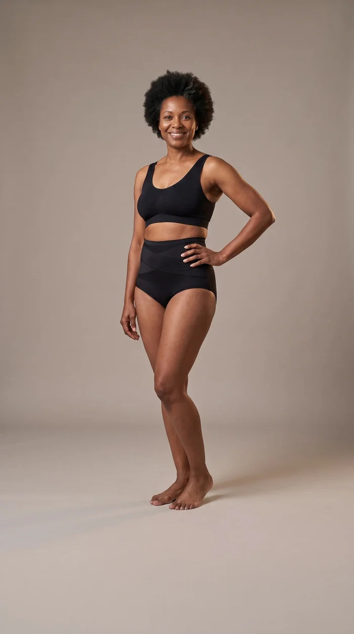 Woman wearing the high waisted brief with crossed straps